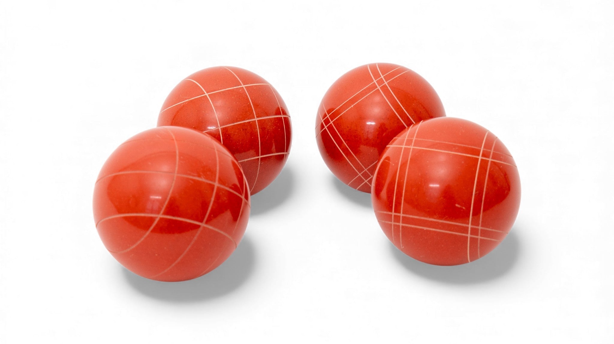 107 mm red solid color bocce balls, the red half of a typical doubles or quads team setup