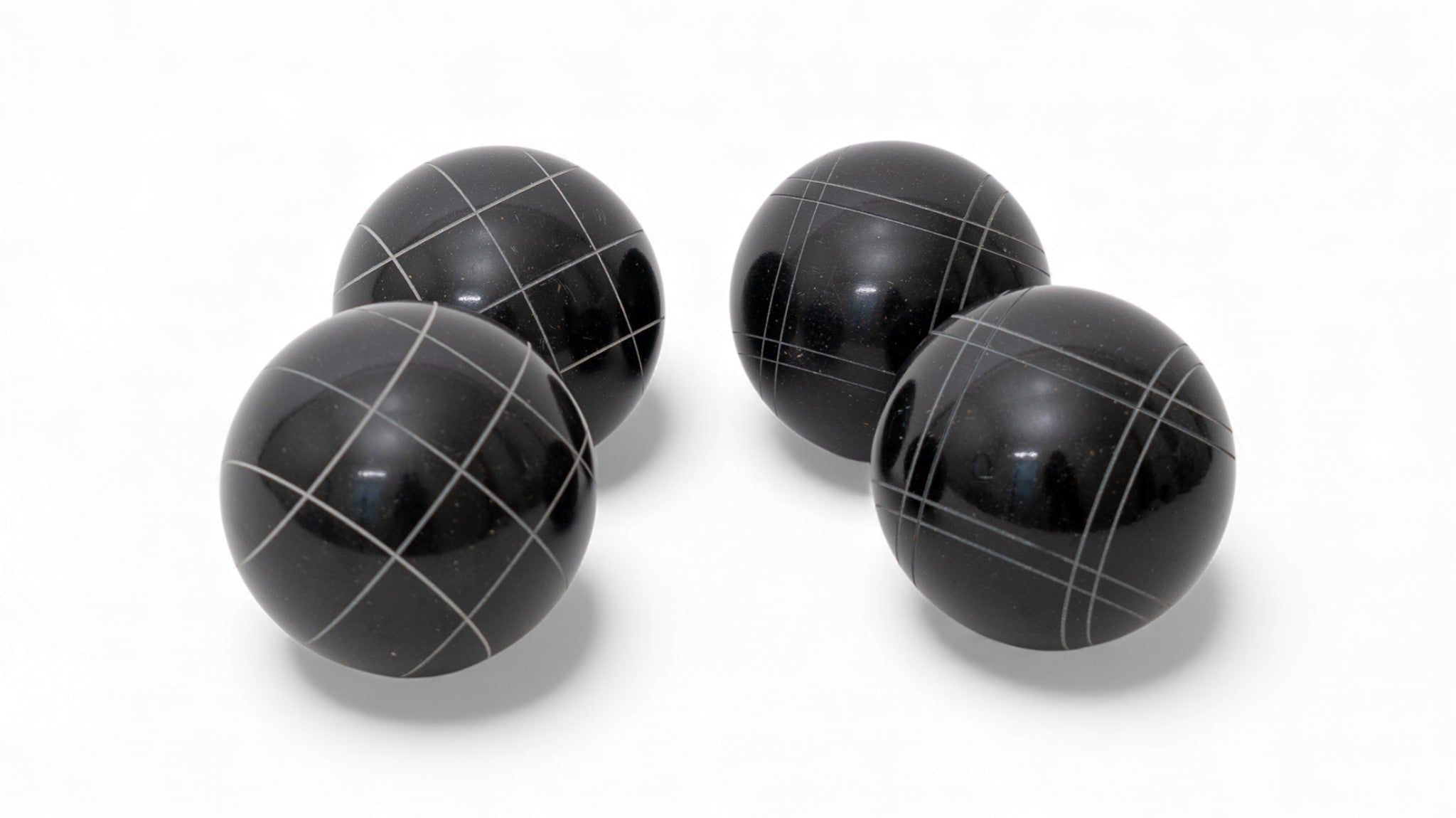 Bocce ball size comparison: 107mm, 110mm, and 114mm tournament balls side by side