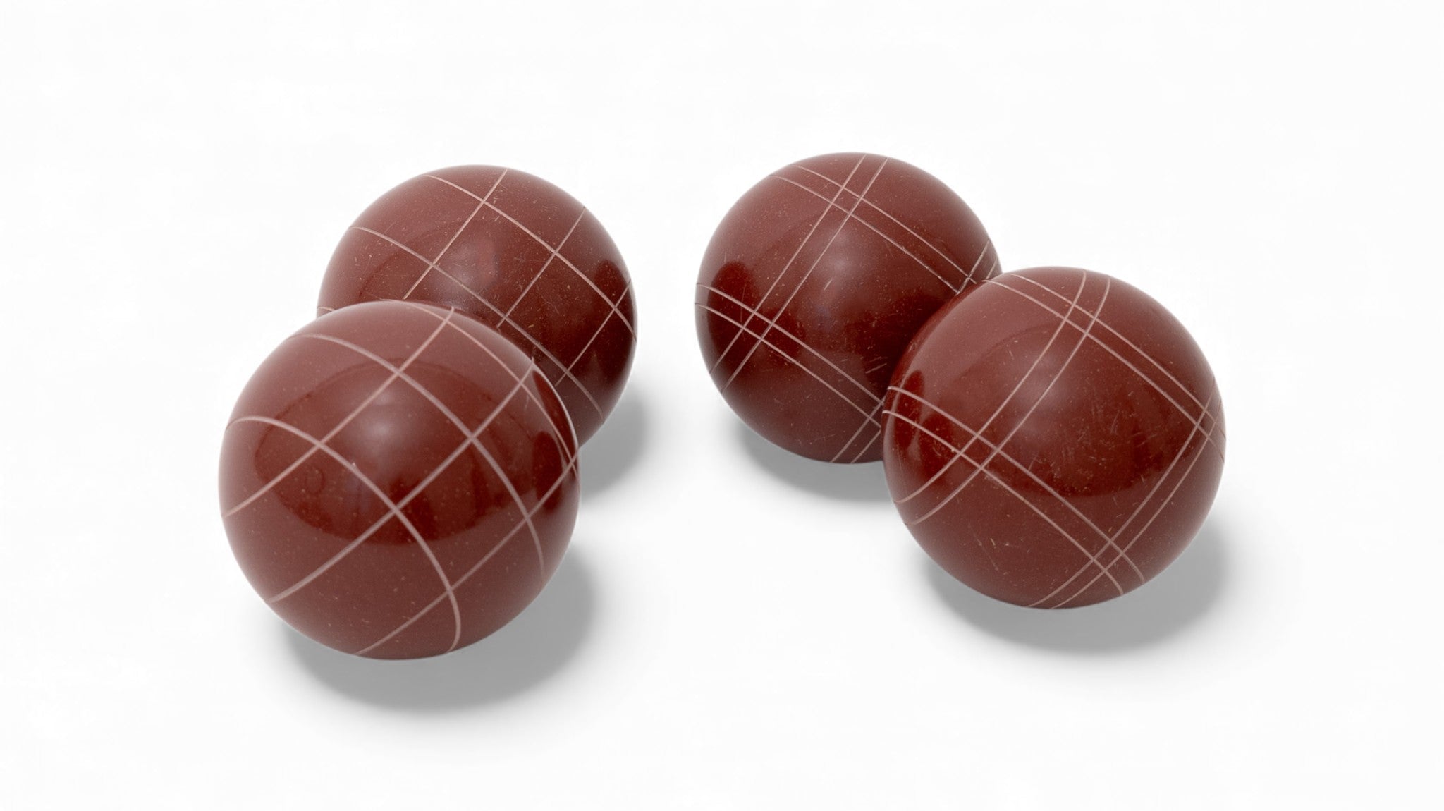 107 mm dark red solid color bocce balls, representing a 4-ball half-set ready to pair for full team play