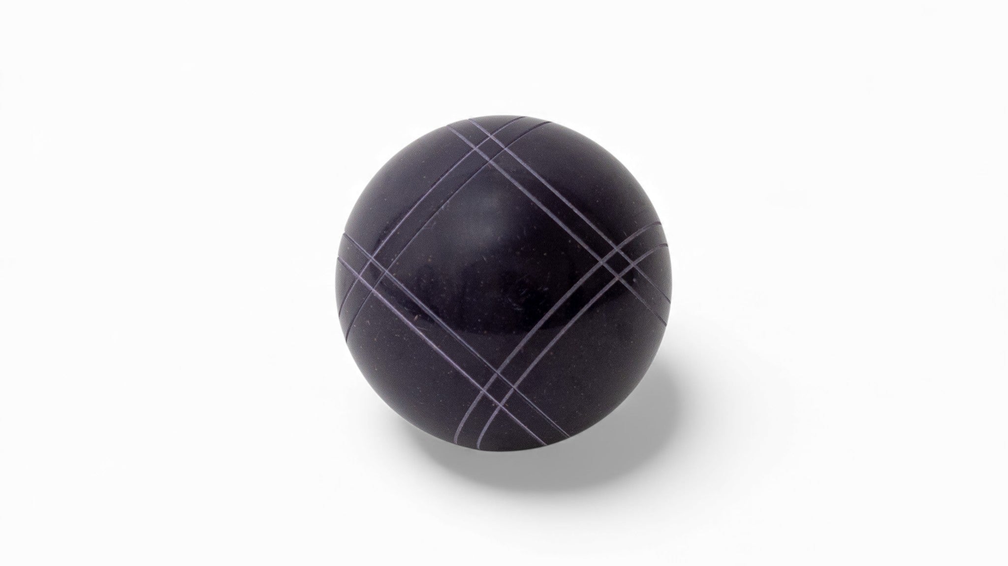 Dark purple bocce ball close up