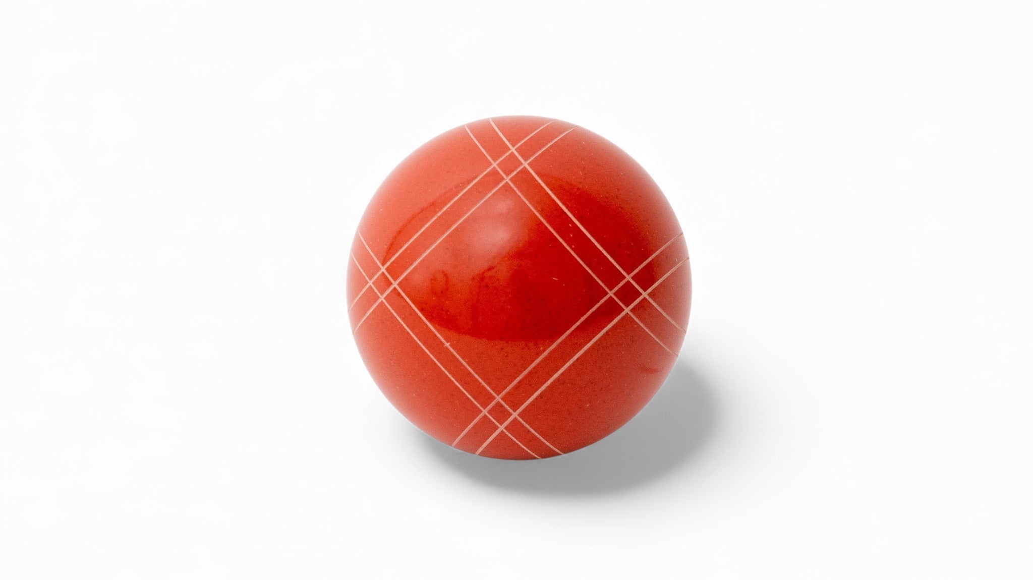 Dark orange bocce ball close up
