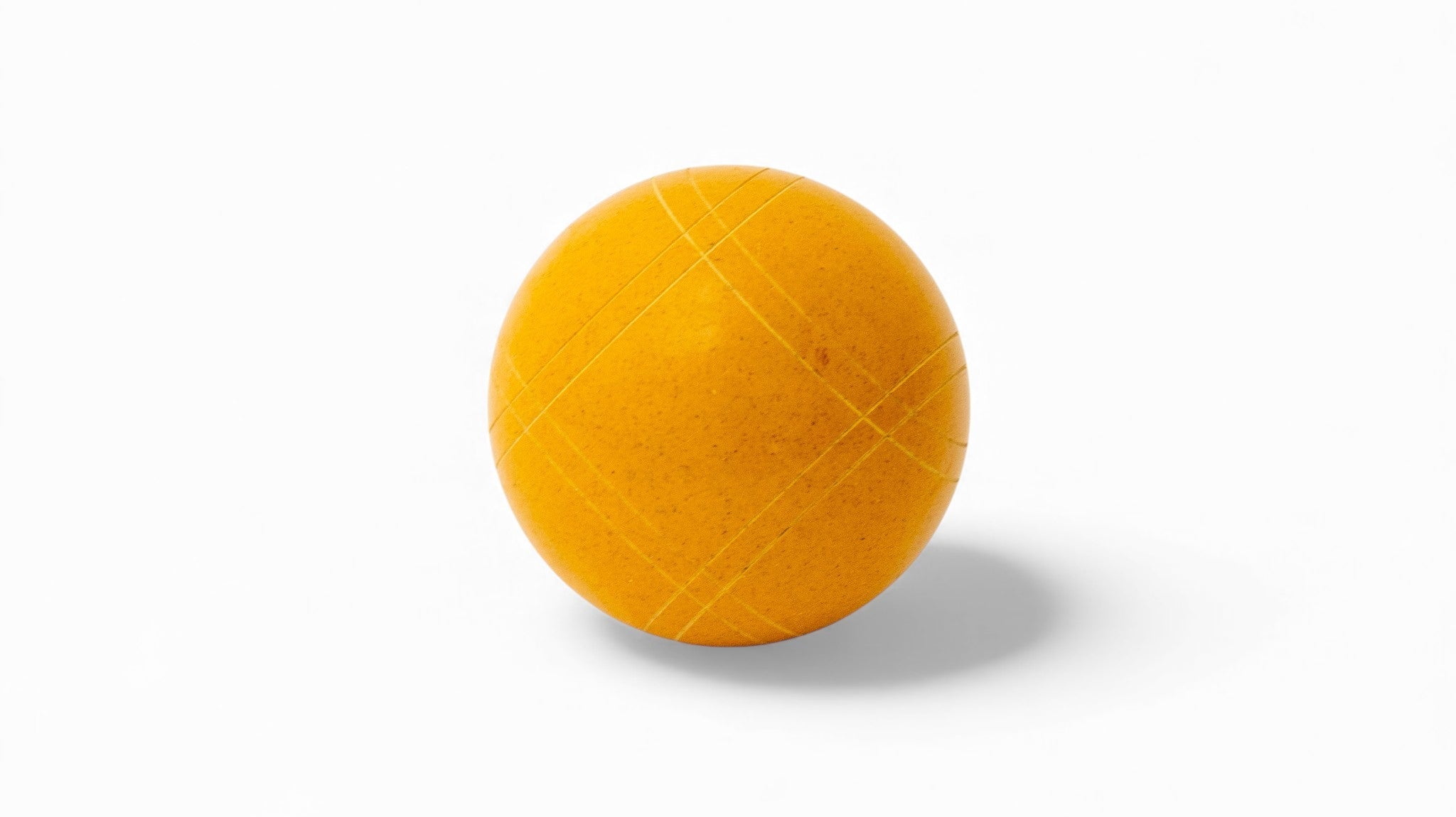 Marigold solid color bocce ball close up