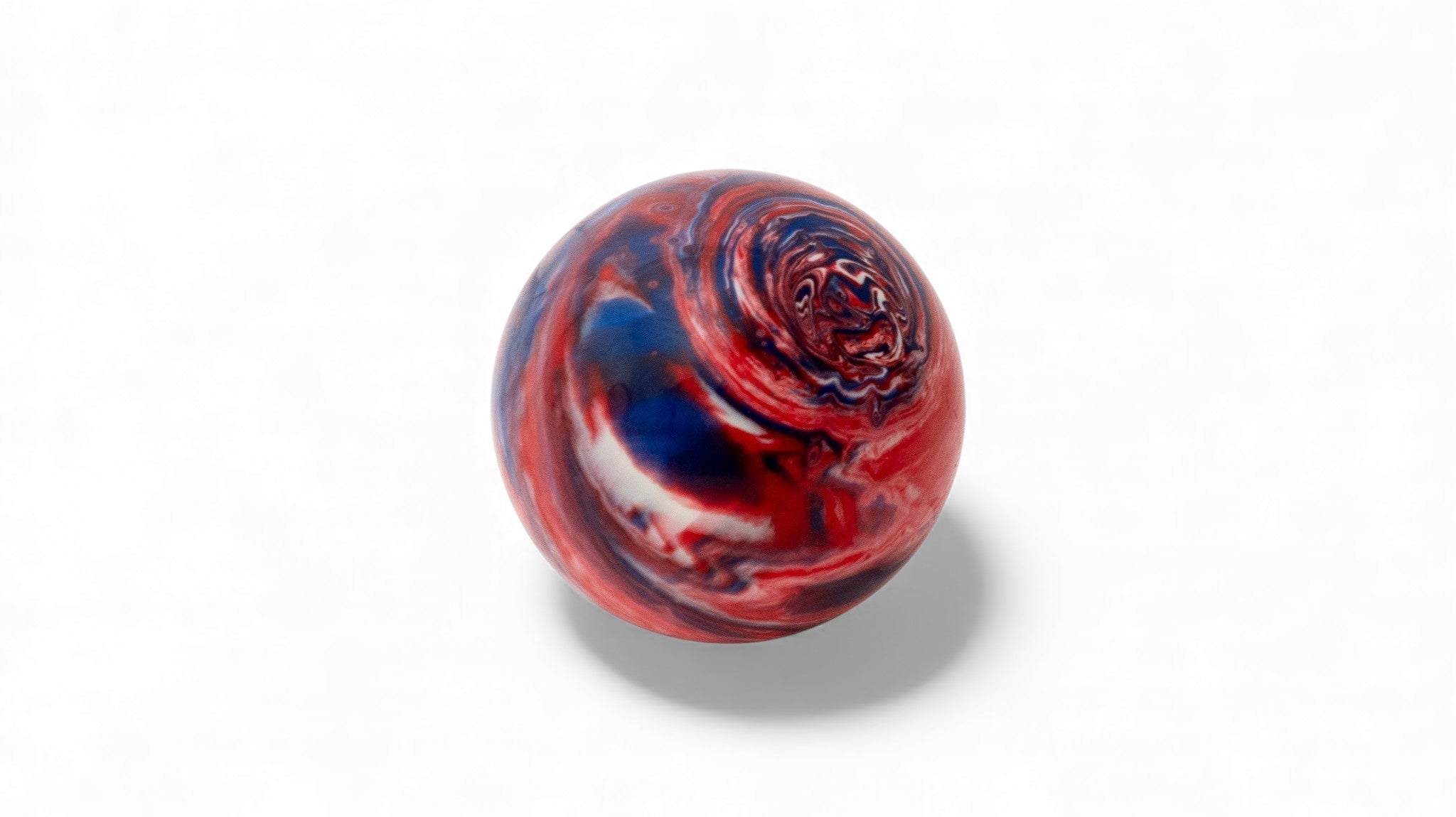 Red white and blue bocce ball close up