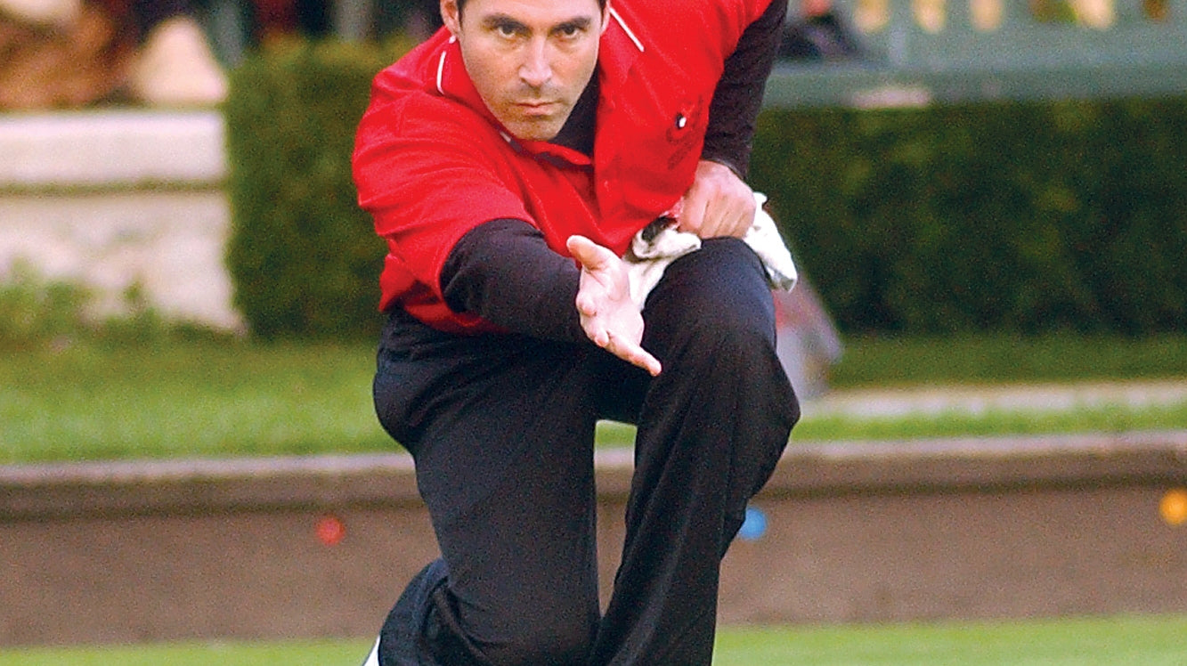 Lawn bowls player, the British cousin of bocce, illustrating the shared etiquette culture across rolling-ball sports
