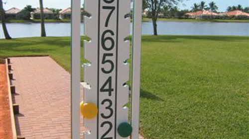The Ultimate Scoreboard for bocce, a permanent wooden mounted bocce scoreboard with sliding peg indicators counting to 21