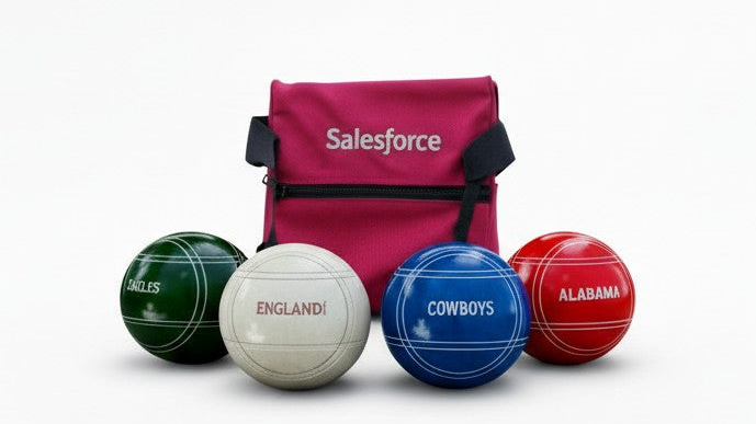 Close-up of a custom engraved bocce ball with personalized text, a popular wedding and retirement gift