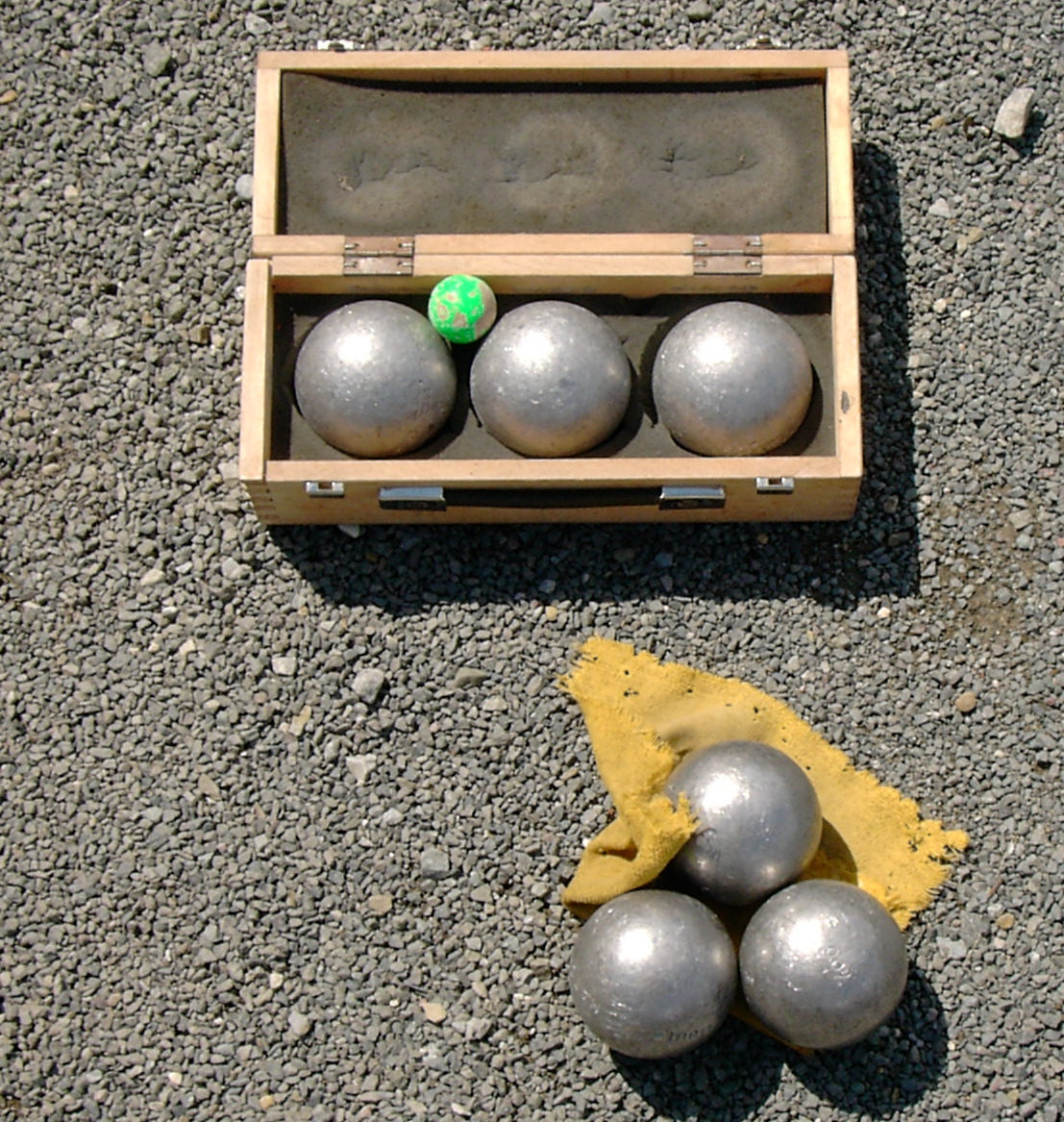 A complete bocce set with balls and pallino, the equipment needed to play a frame