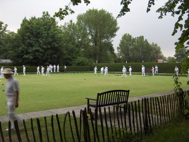 Lawn bowling green with biased bowls
