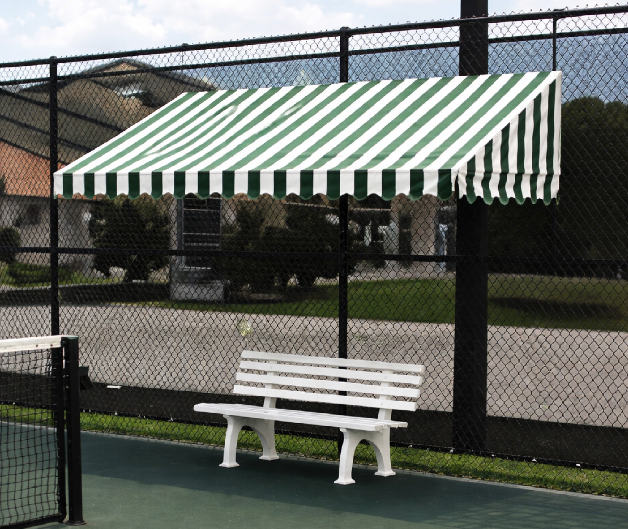 Bocce rules for ball boundaries with green-white fence canopy