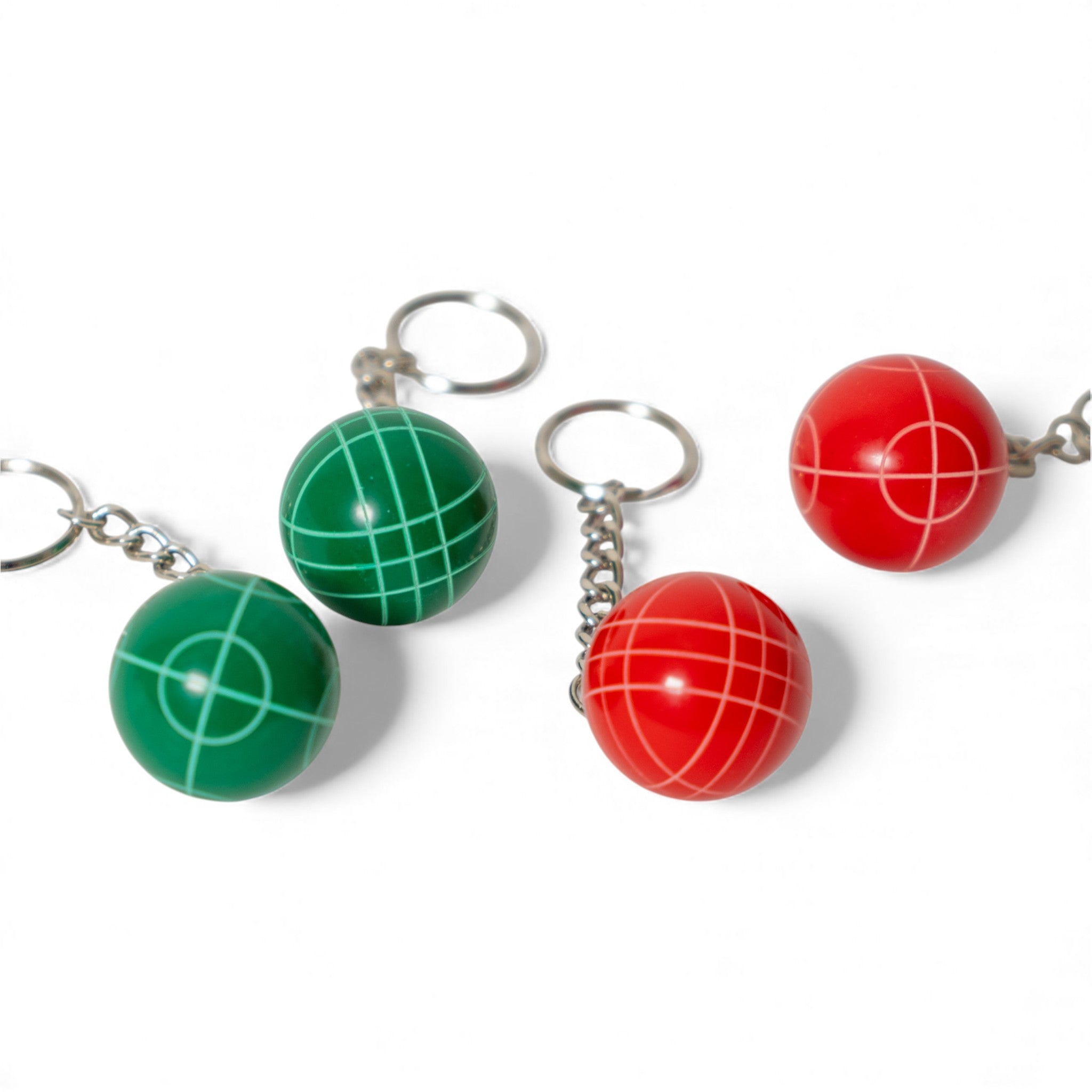Half red half green bocce keychain, a miniature representation of the bocce ball size question