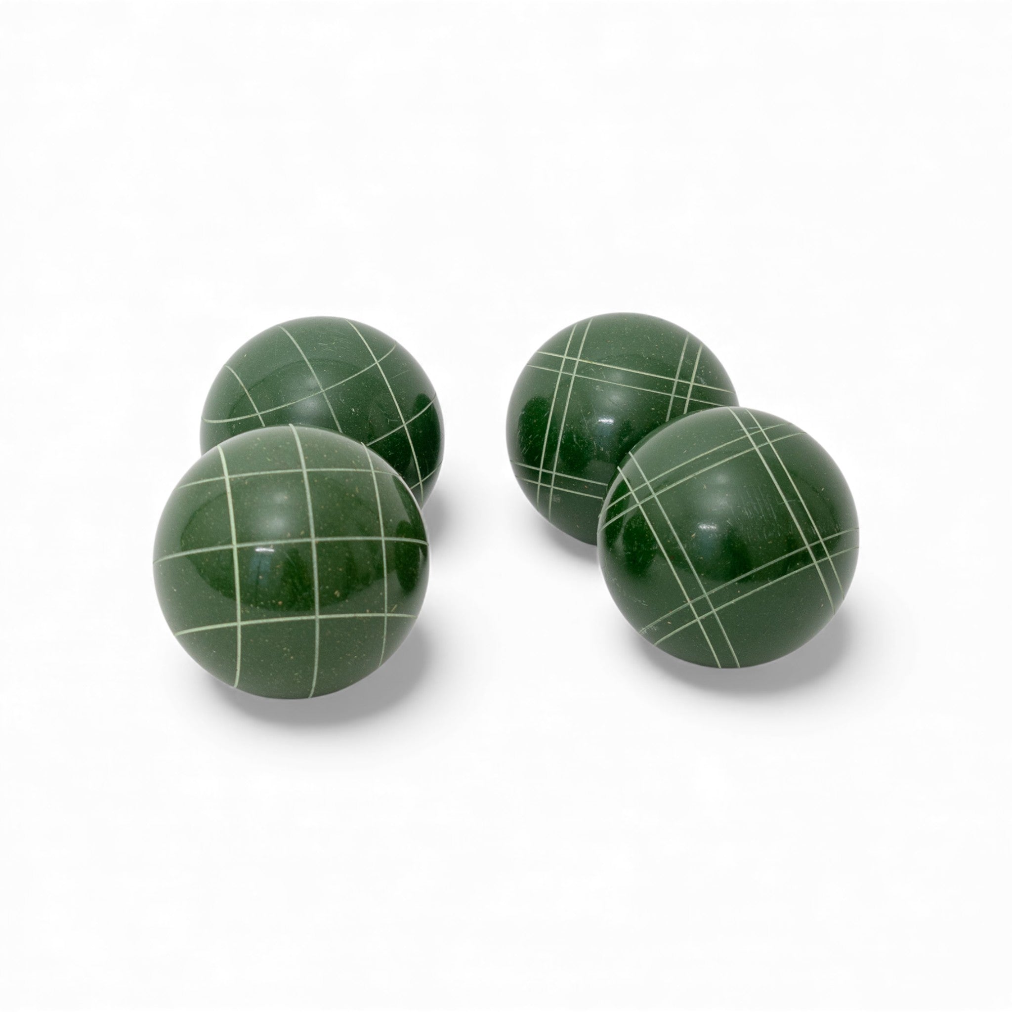 110 mm dark green bocce balls, the grass-friendly size for backyard lawn play