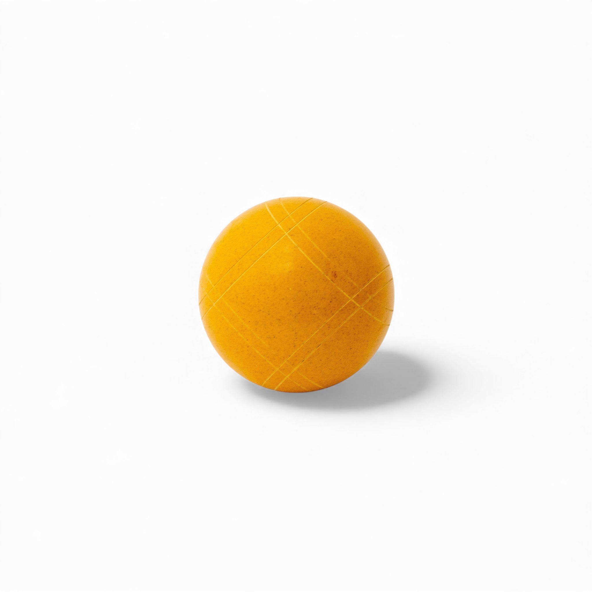 Marigold solid color bocce ball close up