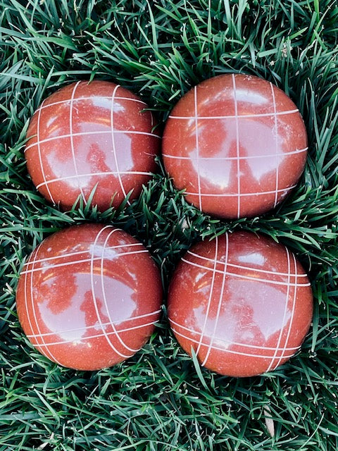 EPCO 107mm Tournament 4 Ball Bocce Balls - dark red balls and mix of striping